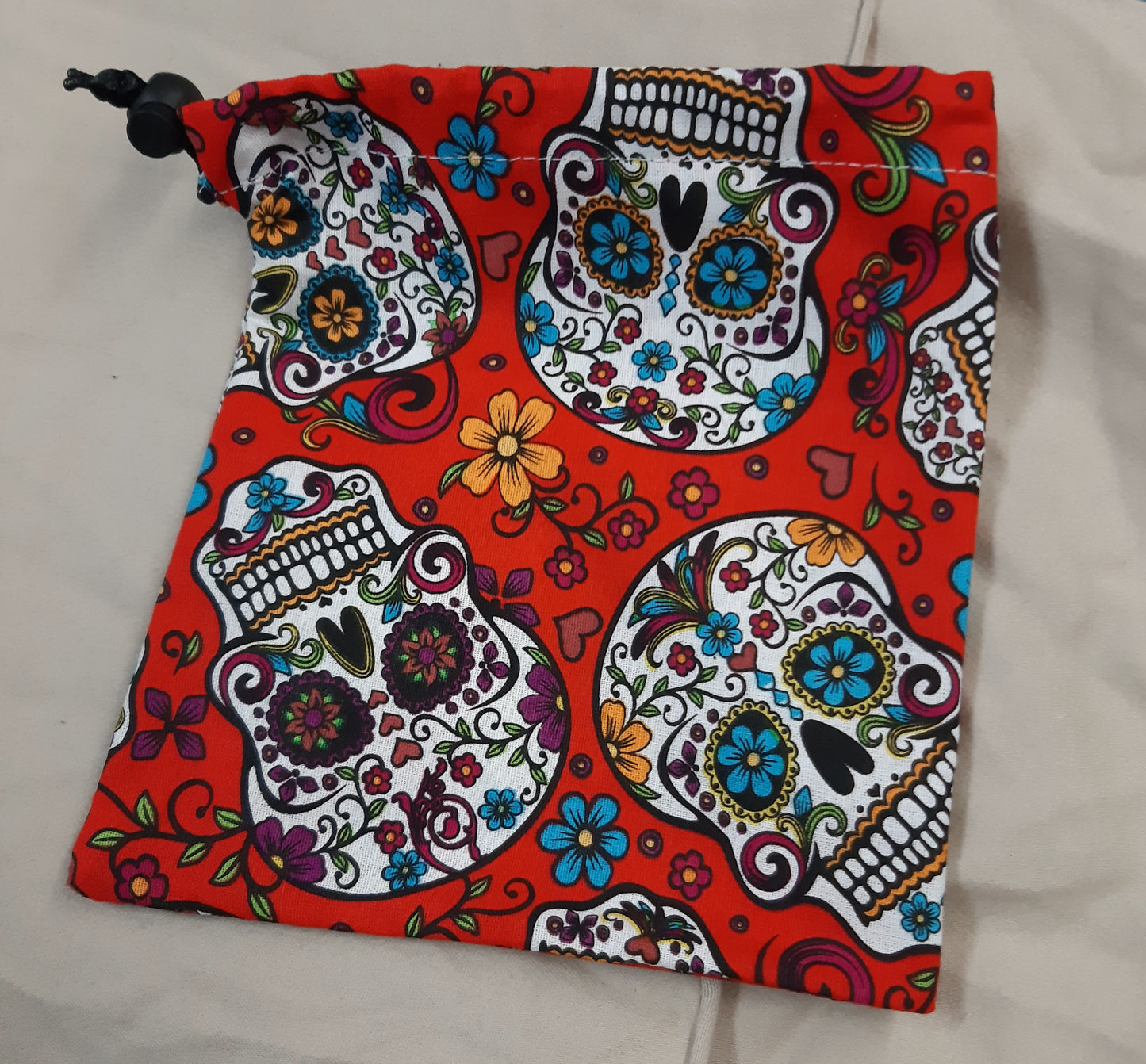 Sugar Skulls on Red Dice Bag