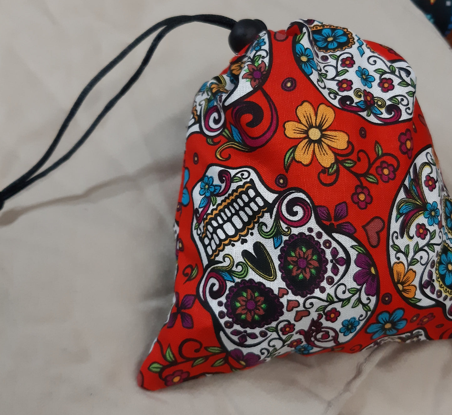 Sugar Skulls on Red Dice Bag